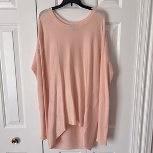 Gently used Poof sweater. Light pink color and with long sleeves